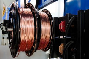 Removing plastic sheath on copper wire